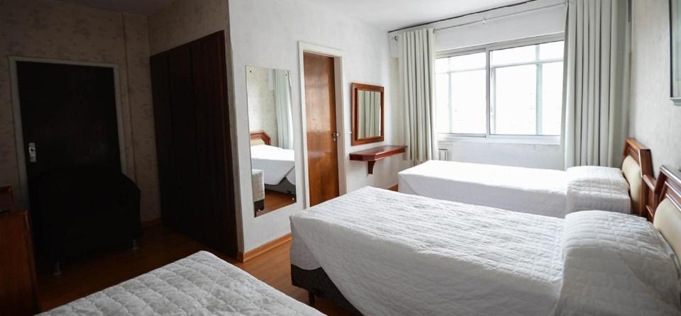 Quarto Triplo Standard com 3 Camas de Solteiro